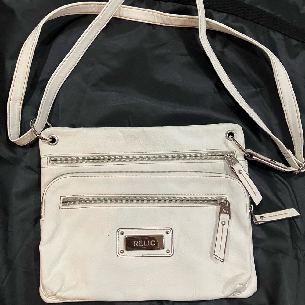 White cross body purse by relic